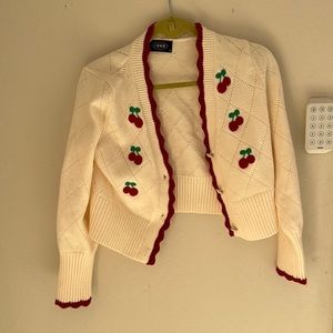 Knit fabric sweater with cherries. Size medium.